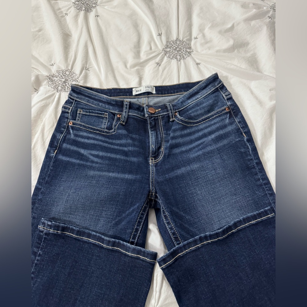 BKE Stella Mid-Rise Slim Fit Boot cut Jeans. Darker blue.